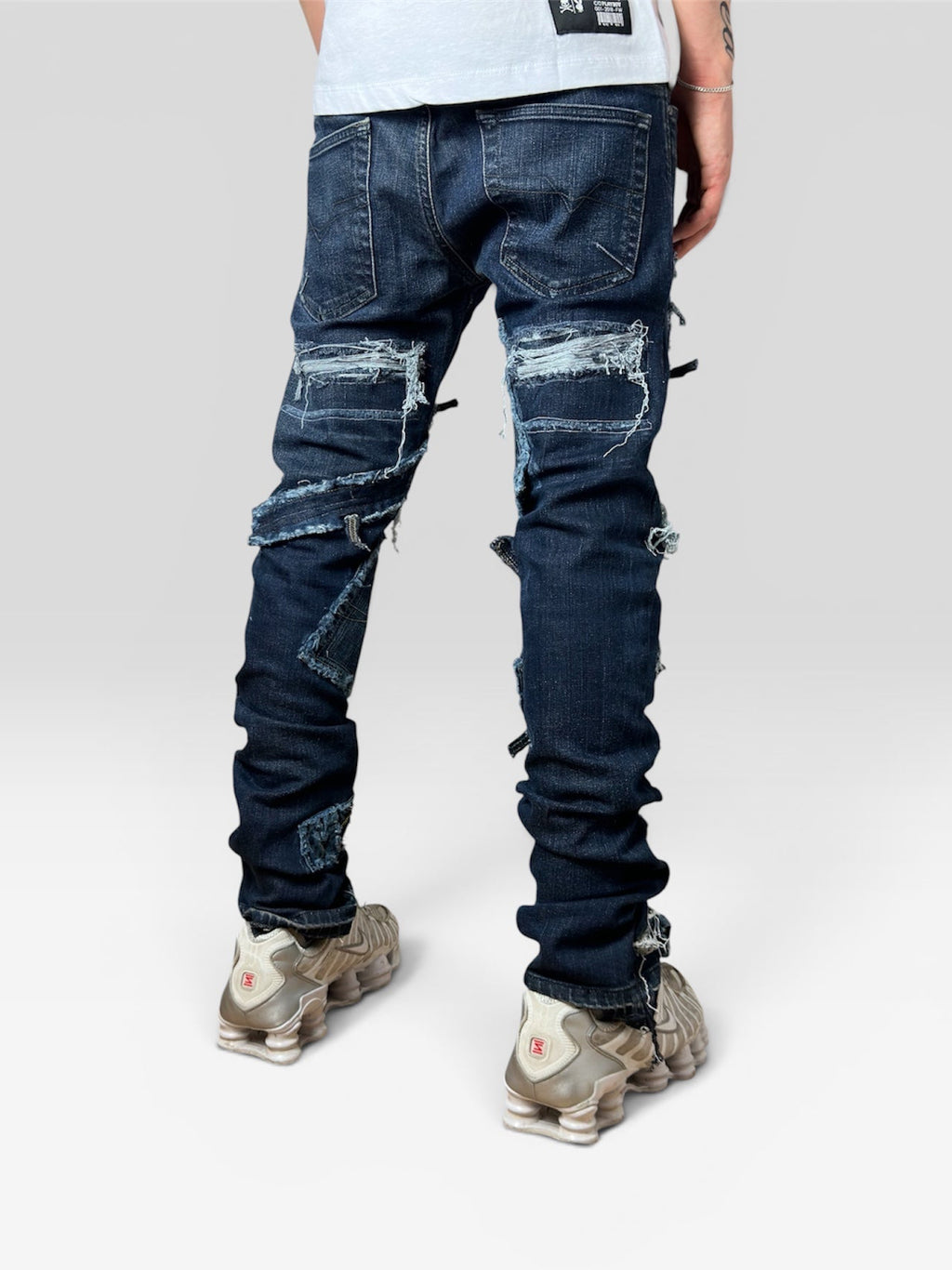 1of1 distressed blue jeans
