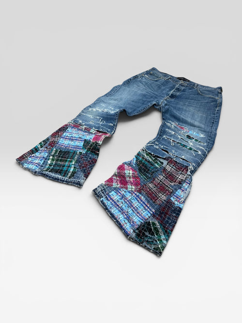 1of1 distressed boro jeans