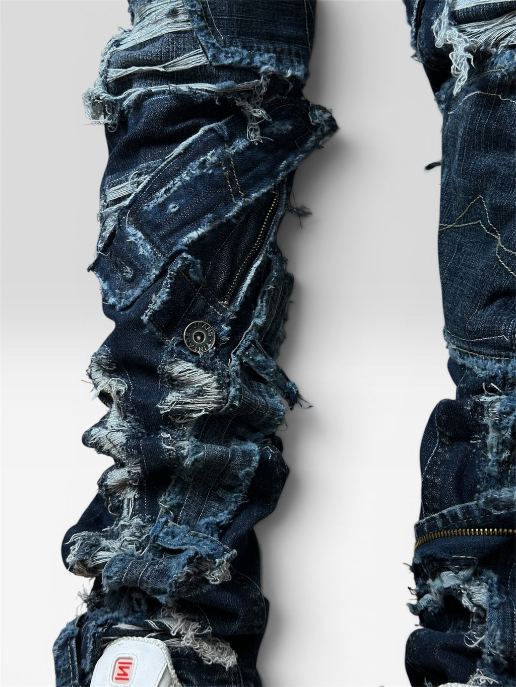 1of1 distressed blue jeans