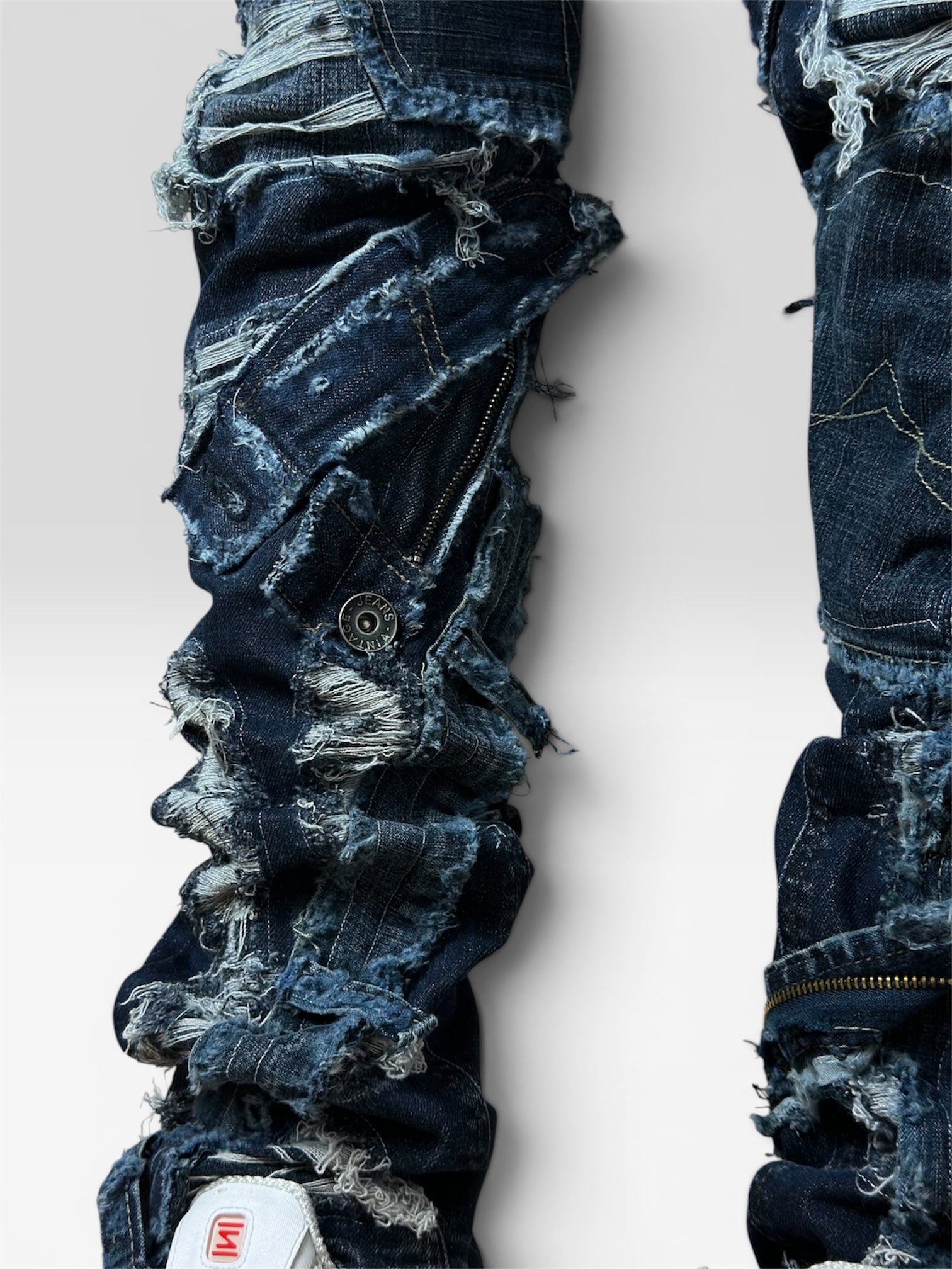 1of1 distressed blue jeans