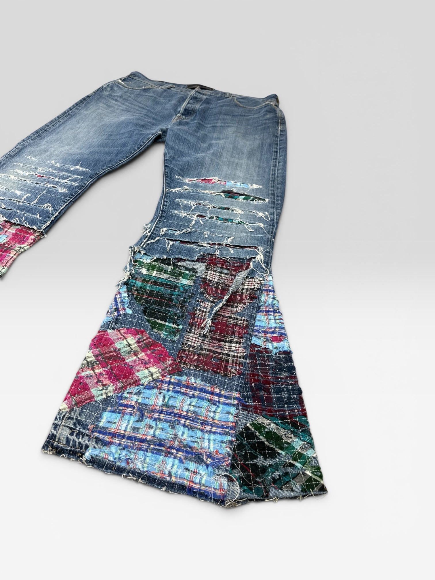 1of1 distressed boro jeans